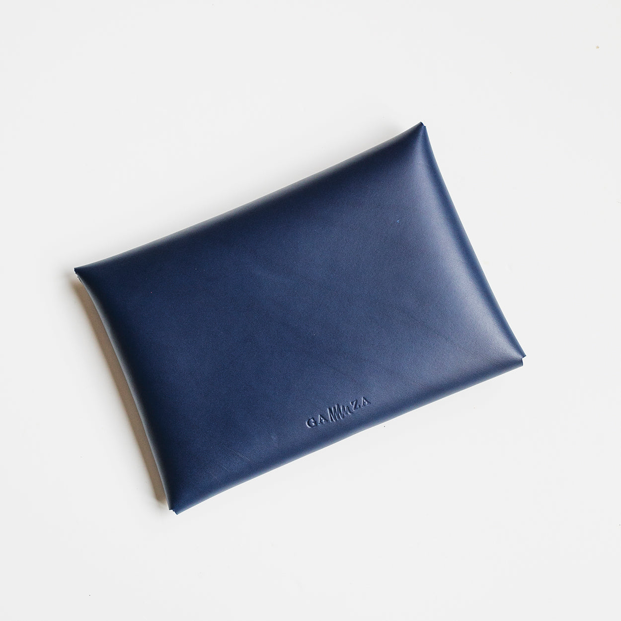 Cartera de mano de cuero