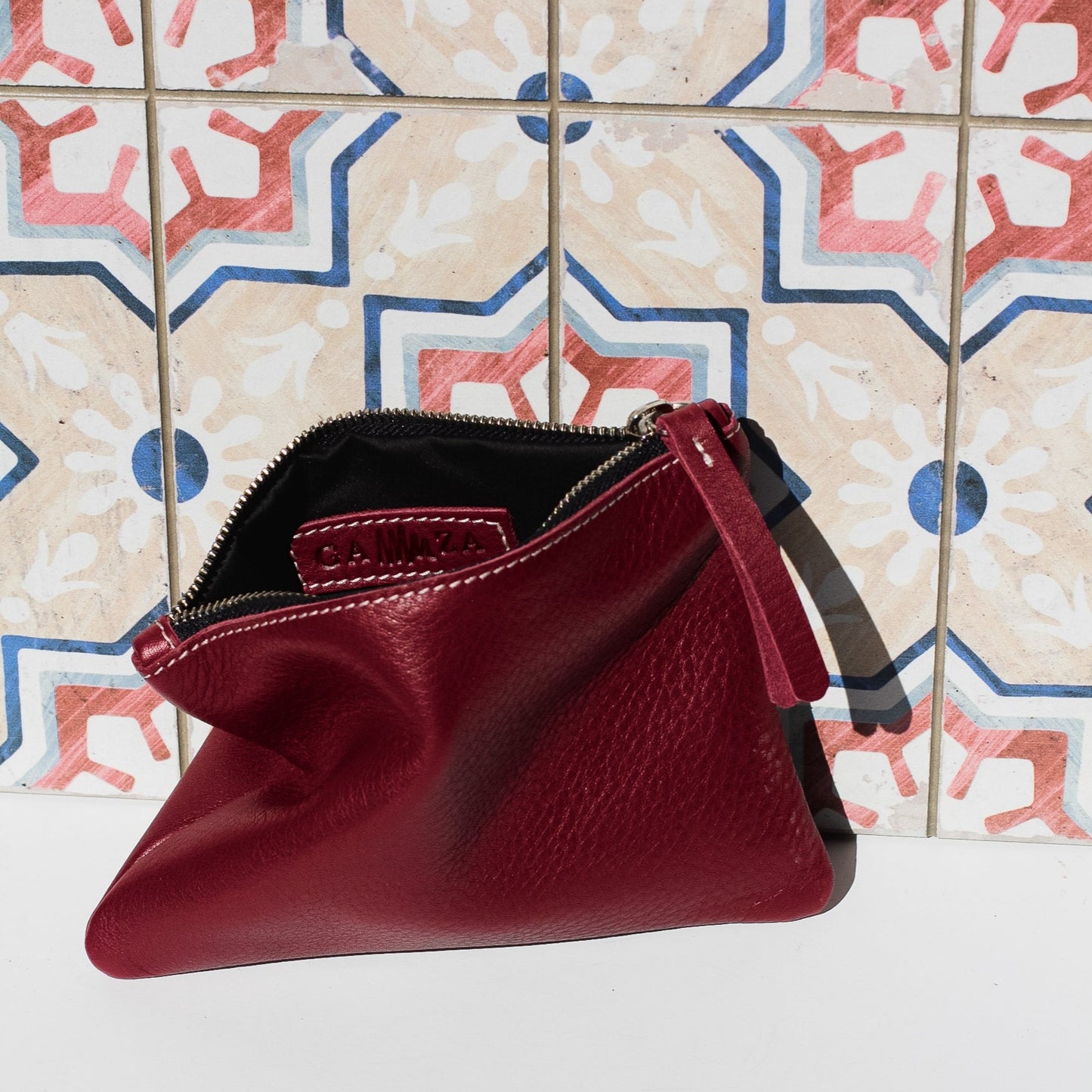 Cartera de cuero granate