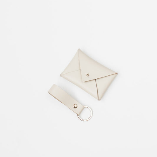 Pack sobre y llavero crudo