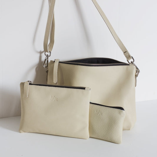 Pouch de cuero con asas crudo